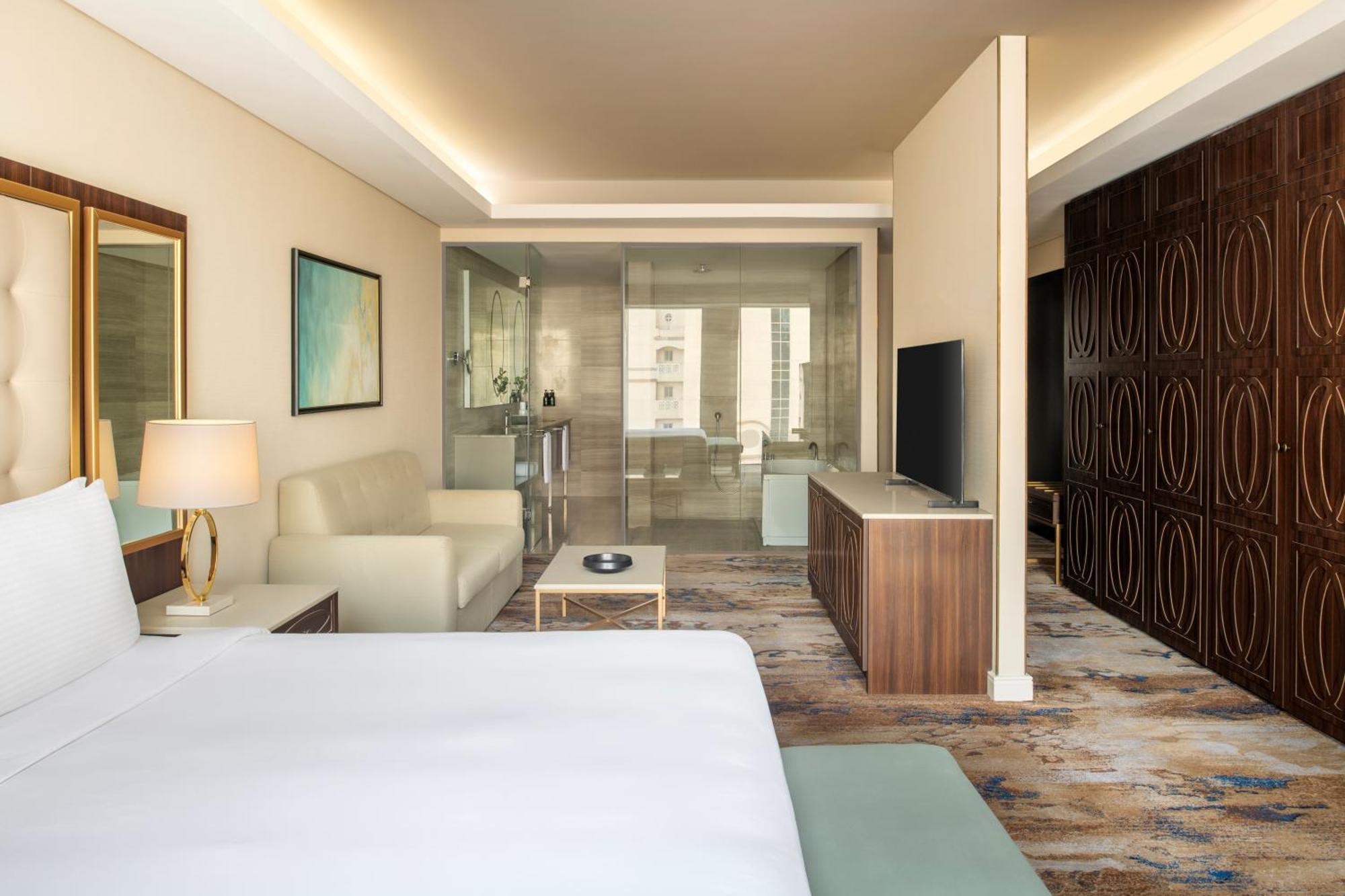 Dusit Doha Hotel Exterior foto A guest room at the hotel